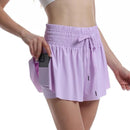 (Compre 1 e Leve 2)  Shorts BellaFit™ com Saia, Cós Alto Elástico e Bolso Funcional
